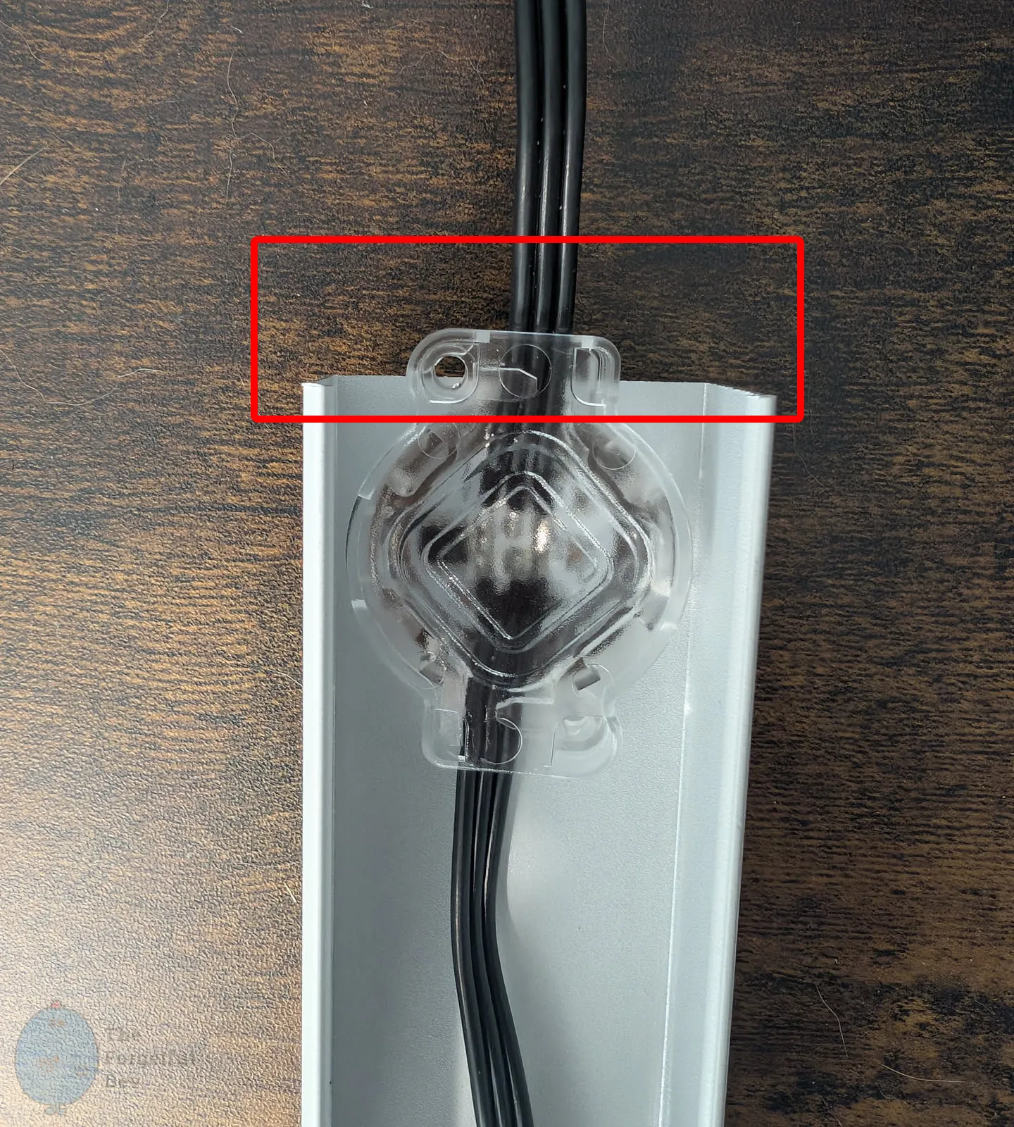 The opening wasn't cut through, but the puck sticks out past the end because it was cut too close.