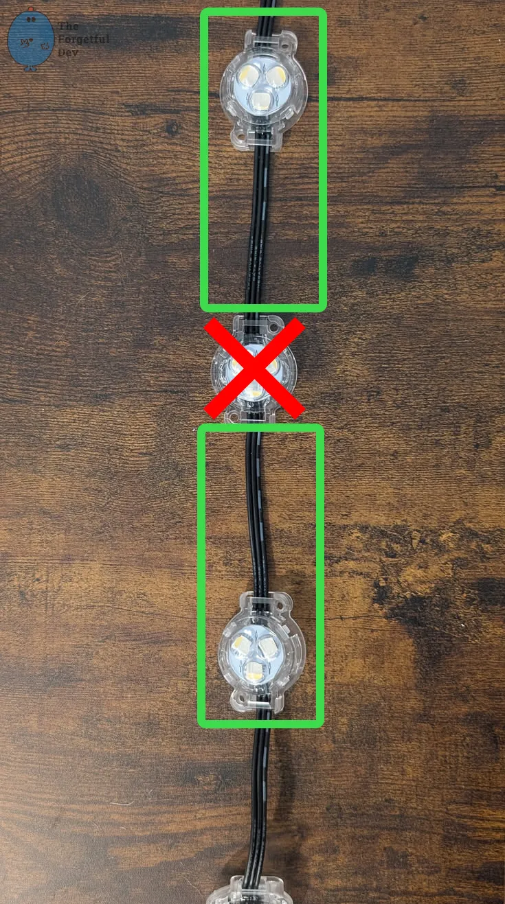 Cut the β middle puck out, splice the the two π© green ones together, and you now have an extended length between two lights.